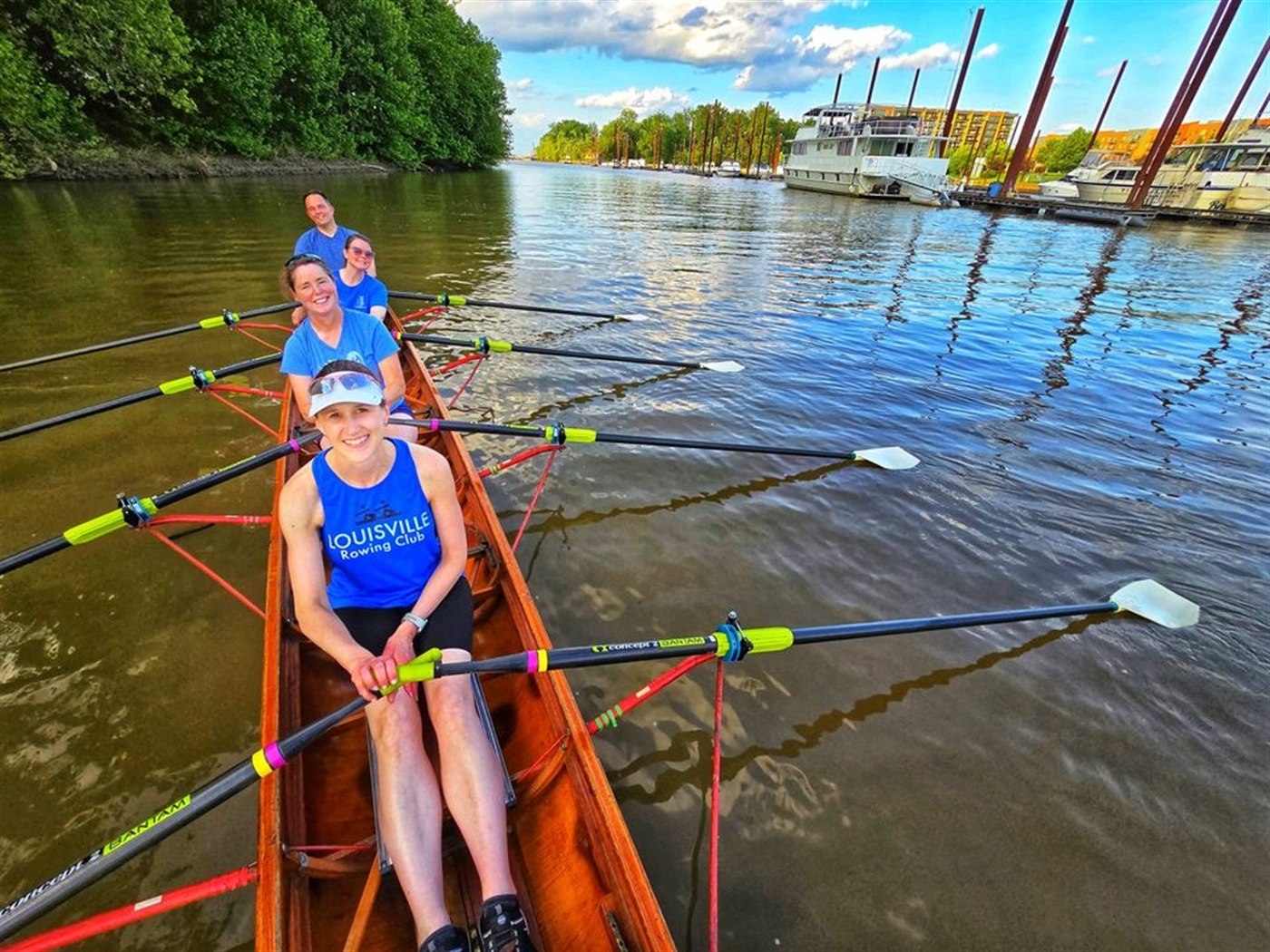 The view from inside a Louisville Rowing Club boat, oars out on the river