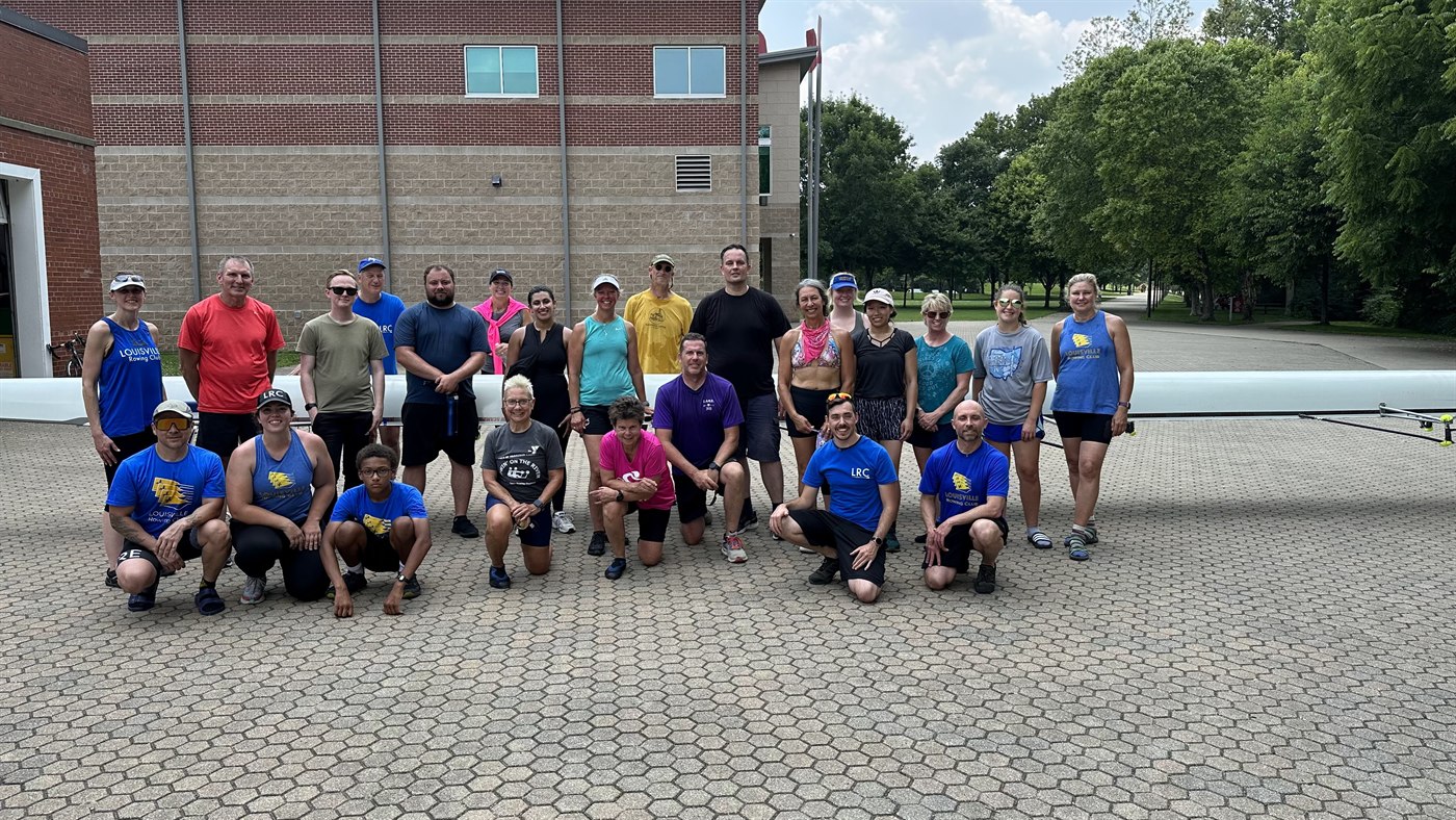 Louisville Rowing Club rowers gathered together at the boathouse